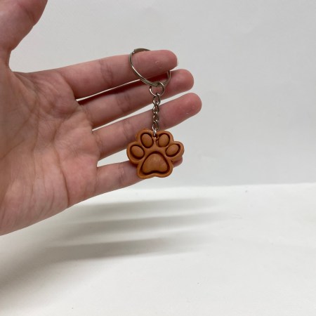Polymer clay, terra-cotta color paw keychain